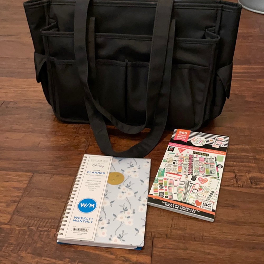 black bag with planner and supplies